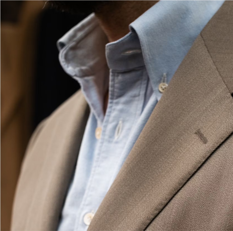 Master tailor applying final touches to a handcrafted suit