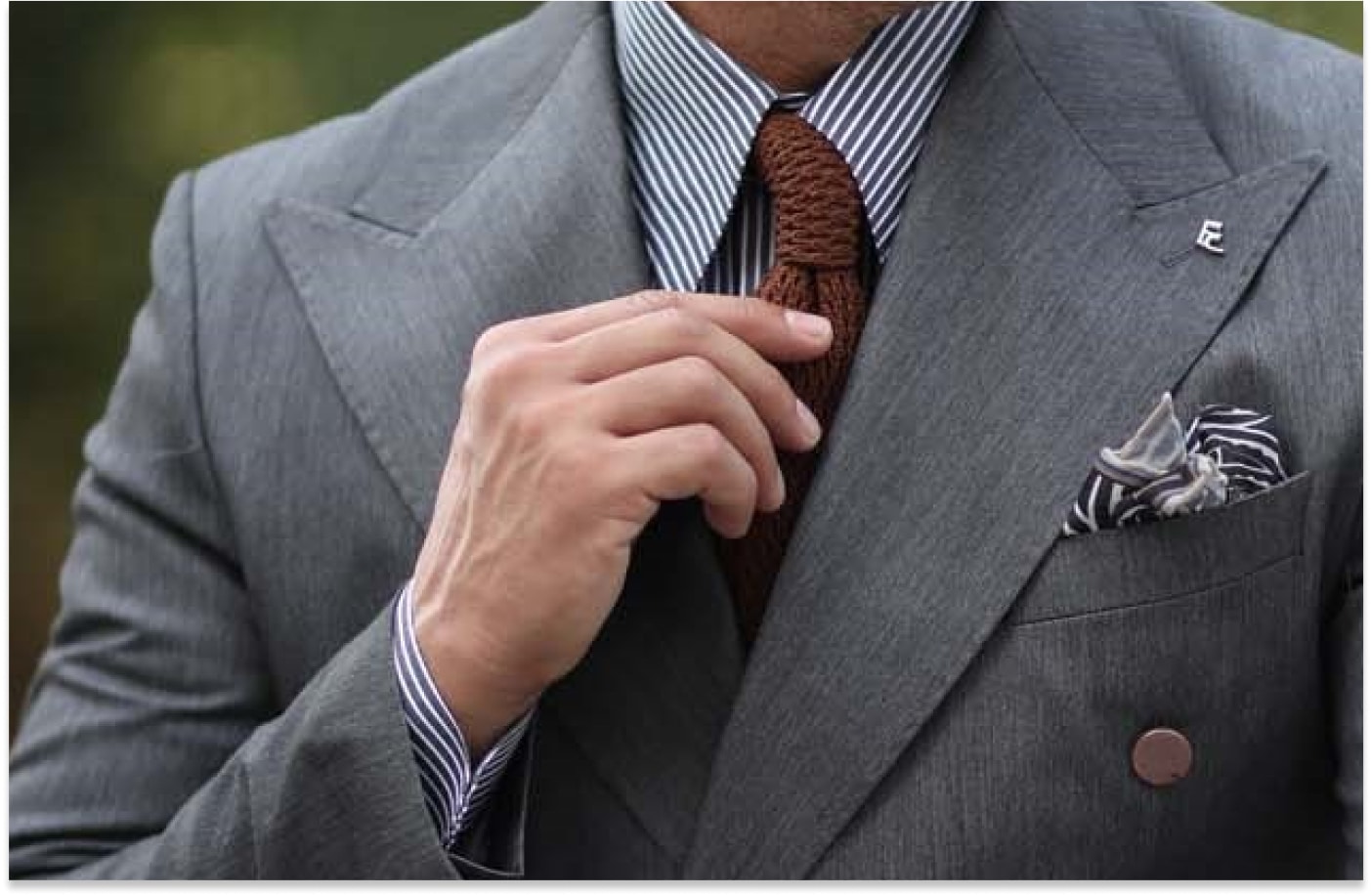 Tailor shaping the shoulder structure of a suit jacket