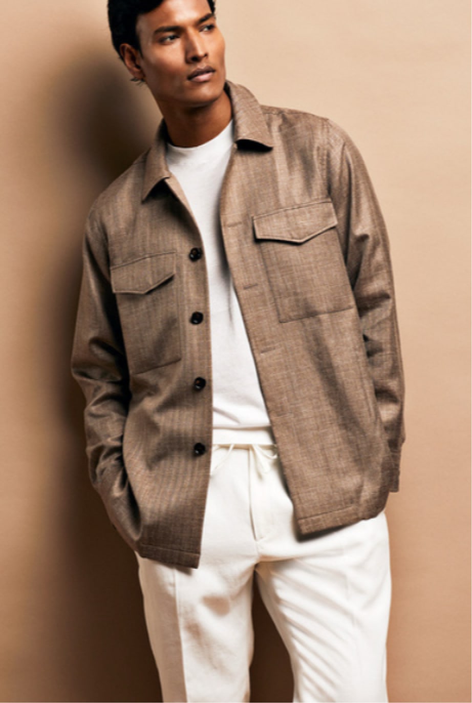 Elegant lifestyle scene showcasing Deletto Milano menswear