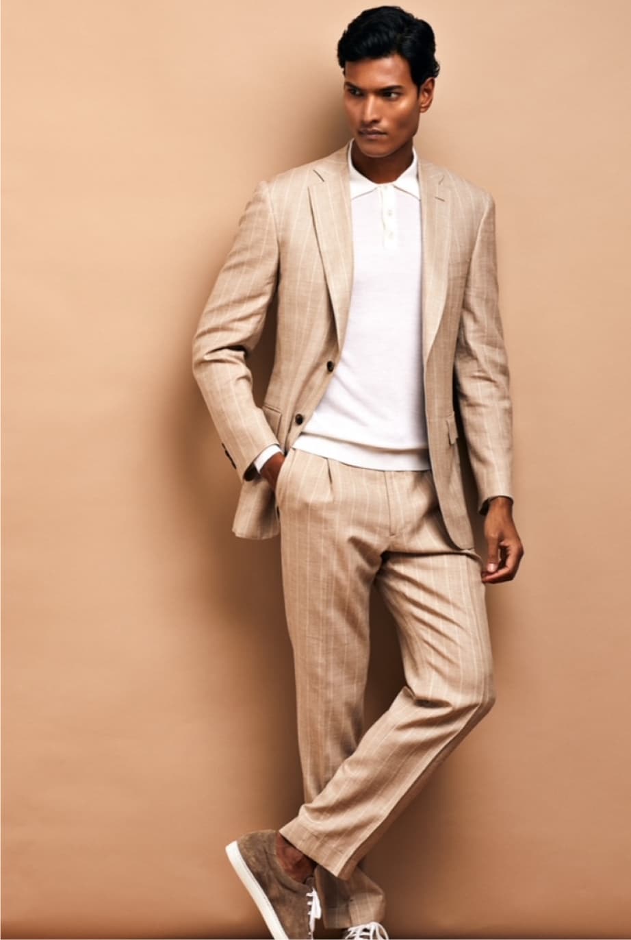 Deletto Milano premium suit displayed on a mannequin with accessories